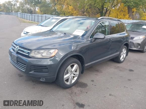 ✅ 2011 Volkswagen Touareg • VIN: WVGFG9BP6BD002363 • Лот: 43541528. Опубликован ранее на IAAI с пробегом 158 306 миль. Бесплатный доступ к архиву аукционных продаж из США и подробный отчёт об истории автомобиля на DreamBid. Изображение 2.