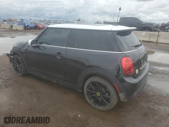 ✅ 2023 MINI Hardtop Cooper SE • VIN: WMW13DJ01P2U19472 • Lot: 59630715. Listed on Copart with 7,304 mi. Free auction sales archive from the USA and detailed vehicle history report at DreamBid. Image 2.