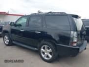 ✅ 2009 Chevrolet Tahoe LTZ • VIN: 1GNFC33J09R184315 • Lot: 42656000. Listed on IAAI with 216,835 mi. Free auction sales archive from the USA and detailed vehicle history report at DreamBid. Image 14.