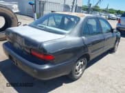 ✅ 1997 Geo Prizm LSi • VIN: 1Y1SK5267VZ447232 • Lot: 42289597. Listed on IAAI with 100,974 mi. Free auction sales archive from the USA and detailed vehicle history report at DreamBid. Image 4.