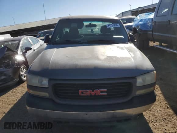 2002 GMC Sierra 1500 z VIN 1GTEC14W92Z280310, wystawiony jako Copart lot #74731204 z przebiegiem 241 075 mil mil oraz Szkoda całkowita • Salvage title. Historia ofert i sprzedaży dostępna na DreamBid. Obrazek 5.