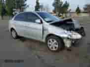 2008 Hyundai Accent GLS z VIN KMHCN46C98U234256, wystawiony jako Copart lot #83089384 z przebiegiem 153 802 mil mil oraz Szkoda całkowita • Salvage title. Historia ofert i sprzedaży dostępna na DreamBid. Obrazek 4.