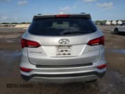 ✅ 2017 Hyundai Santa Fe 2.0T • VIN: 5XYZU4LA9HG429148 • Лот: 69970664. Опубликован ранее на Copart с пробегом 108 075 миль. Бесплатный доступ к архиву аукционных продаж из США и подробный отчёт об истории автомобиля на DreamBid. Изображение 6.