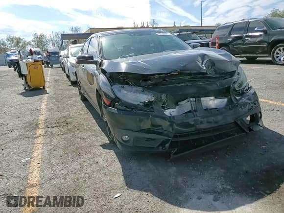 ✅ 2017 Honda Civic Touring • VIN: 19XFC1F96HE009544 • Lot: 86338475. Listed on Copart with 108,092 mi. Free auction sales archive from the USA and detailed vehicle history report at DreamBid. Image 13.