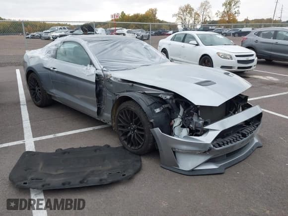✅ 2021 Ford Mustang GT Premium • VIN: 1FA6P8CFXM5111061 • Lot: 43574919. Wystawiony na IAAI z przebiegiem 22 551 mil. Bezpłatny archiwum sprzedaży aukcyjnych z USA i szczegółowy raport historii pojazdu na DreamBid. Zdjęcie 1.