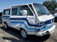 ✅ 1990 Volkswagen Vanagon • VIN: WV2YB025XLG122223 • Лот: 57179115. Опубликован ранее на Copart с пробегом 431 880 миль. Бесплатный доступ к архиву аукционных продаж из США и подробный отчёт об истории автомобиля на DreamBid. Изображение 4.