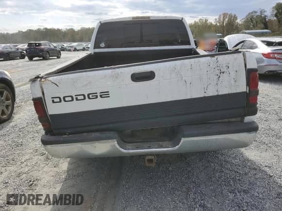 1999 Dodge 1500 z VIN 1B7HC13Y1XJ500111, wystawiony jako Copart lot #76067834 z przebiegiem Nie podano mil oraz Szkoda całkowita • Salvage title. Historia ofert i sprzedaży dostępna na DreamBid. Obrazek 6.