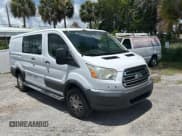 ✅ 2015 Ford Transit Cargo • VIN: 1FTNR1ZM6FKA47229 • Lot: 61978315. Listed on Copart with 227,678 mi. Free auction sales archive from the USA and detailed vehicle history report at DreamBid. Image 1.