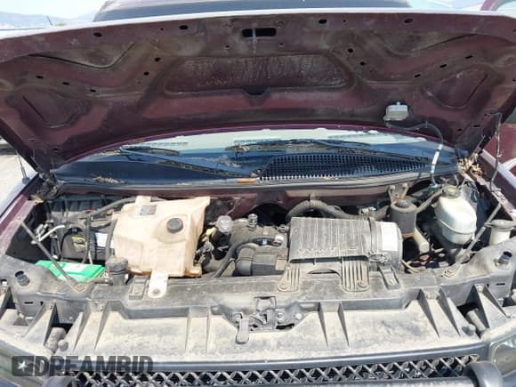 ✅ 2004 Chevrolet Express Passenger • VIN: 1GBFG15T441149305 • Lot: 43040447. Listed on IAAI with 169,635 mi. Free auction sales archive from the USA and detailed vehicle history report at DreamBid. Image 10.