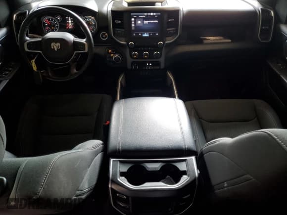 ✅ 2023 Ram 1500 Lone Star • VIN: 1C6SRFMT8PN563534 • Lot: 64243355. Listed on Copart with 24,883 mi. Free auction sales archive from the USA and detailed vehicle history report at DreamBid. Image 8.