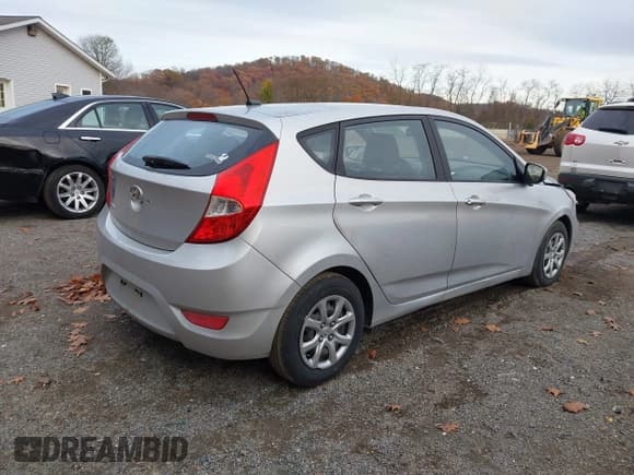 ✅ 2014 Hyundai Accent GS • VIN: KMHCT5AE4EU185824 • Lot: 43672608. Listed on IAAI with 199,283 mi. Free auction sales archive from the USA and detailed vehicle history report at DreamBid. Image 4.