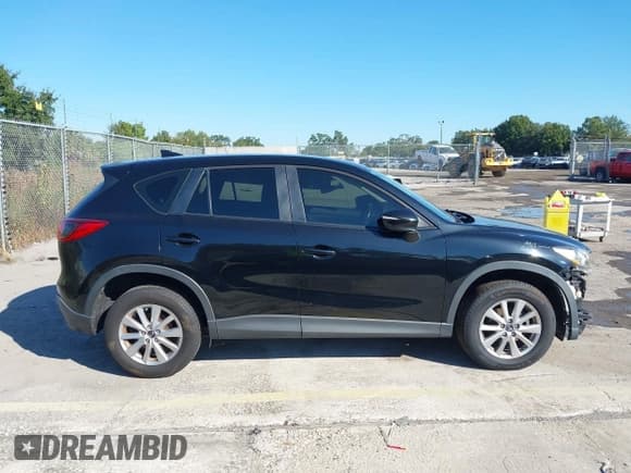 ✅ 2016 Mazda CX-5 Sport • VIN: JM3KE2BY8G0715795 • Lot: 43562802. Listed on IAAI with 129,307 mi. Free auction sales archive from the USA and detailed vehicle history report at DreamBid. Image 14.