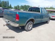 ✅ 1998 Ford F-150 • VIN: 2FTZX18W5WCA21252 • Lot: 42479264. Listed on IAAI with 259,489 mi. Free auction sales archive from the USA and detailed vehicle history report at DreamBid. Image 4.