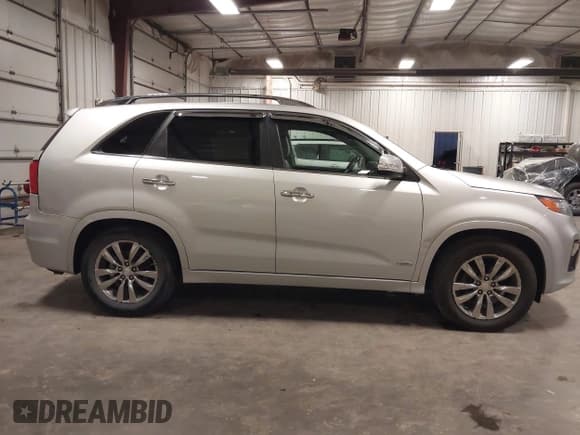 ✅ 2012 Kia Sorento SX • VIN: 5XYKWDA25CG285307 • Лот: 43116669. Опубликован ранее на IAAI с пробегом 147 130 миль. Бесплатный доступ к архиву аукционных продаж из США и подробный отчёт об истории автомобиля на DreamBid. Изображение 13.