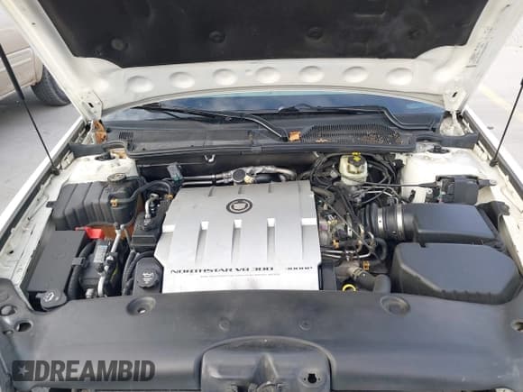 ✅ 2004 Cadillac DeVille DTS • VIN: 1G6KF579X4U238691 • Lot: 41367367. Listed on IAAI with 69,902 mi. Free auction sales archive from the USA and detailed vehicle history report at DreamBid. Image 10.