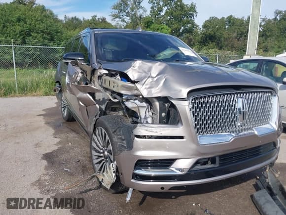 ✅ 2019 Lincoln Navigator Reserve • VIN: 5LMJJ3LT4KEL22261 • Лот: 43293071. Опубликован ранее на IAAI с пробегом 99 006 миль. Бесплатный доступ к архиву аукционных продаж из США и подробный отчёт об истории автомобиля на DreamBid. Изображение 6.