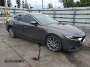 ✅ 2021 Mazda 3 Preferred • VIN: 3MZBPBCL6MM200094 • Lot: 81243655. Listed on Copart with 72,167 mi. Free auction sales archive from the USA and detailed vehicle history report at DreamBid. Image 4.