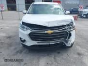 ✅ 2021 Chevrolet Traverse LT Cloth • VIN: 1GNERGKW0MJ126548 • Lot: 42998904. Wystawiony na IAAI z przebiegiem 66 776 mil. Bezpłatny archiwum sprzedaży aukcyjnych z USA i szczegółowy raport historii pojazdu na DreamBid. Zdjęcie 17.