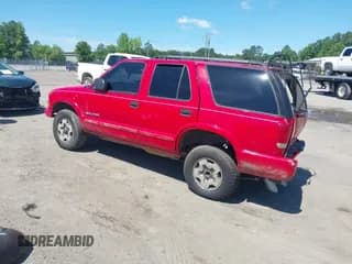 ✅ 2004 Chevrolet Blazer LS • VIN: 1GNDT13X44K113359 • Lot: 42279143. Wystawiony na IAAI z przebiegiem 137 260 mil. Bezpłatny archiwum sprzedaży aukcyjnych z USA i szczegółowy raport historii pojazdu na DreamBid. Zdjęcie 3.