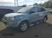 2009 Hyundai Tucson GLS with VIN KM8JM12B89U934874, listed as a Copart auction lot 71933114 with 134,770 mi miles and Salvage title. Bid and sale history available at DreamBid. Image 1.