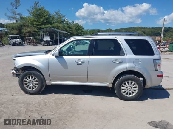 2010 Mercury Mariner Premier z VIN 4M2CN9HGXAKJ16116, wystawiony jako IAAI lot #43140056 z przebiegiem 194 370 mil mil oraz . Historia ofert i sprzedaży dostępna na DreamBid. Obrazek 15.