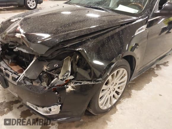 ✅ 2012 Cadillac CTS Premium • VIN: 1G6DP5E30C0108722 • Lot: 41844089. Listed on IAAI with 176,525 mi. Free auction sales archive from the USA and detailed vehicle history report at DreamBid. Image 6.