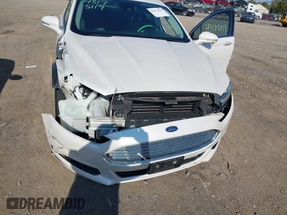 ✅ 2016 Ford Fusion Titanium • VIN: 3FA6P0SU6GR357415 • Lot: 43175119. Listed on IAAI with 92,373 mi. Free auction sales archive from the USA and detailed vehicle history report at DreamBid. Image 6.