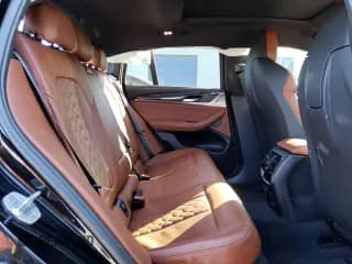 ✅ 2021 BMW X4 M • VIN: 5YMUJ0C07M9H06811 • Lot: 60352142. Wystawiony na Copart z przebiegiem 20 169 mil. Bezpłatny archiwum sprzedaży aukcyjnych z USA i szczegółowy raport historii pojazdu na DreamBid. Zdjęcie 6.