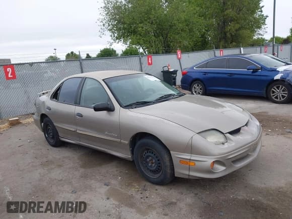 ✅ 2001 Pontiac Sunfire SE • VIN: 1G2JB524317251765 • Lot: 42271530. Wystawiony na IAAI z przebiegiem 194 319 mil. Bezpłatny archiwum sprzedaży aukcyjnych z USA i szczegółowy raport historii pojazdu na DreamBid. Zdjęcie 1.