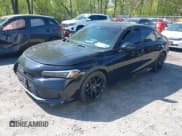 ✅ 2023 Honda Civic Sport • VIN: 2HGFE2F57PH530869 • Lot: 42232920. Listed on IAAI with 62,792 mi. Free auction sales archive from the USA and detailed vehicle history report at DreamBid. Image 2.