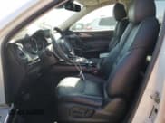 ✅ 2021 Mazda CX-9 Touring • VIN: JM3TCACYXM0514219 • Lot: 66174445. Wystawiony na Copart z przebiegiem 60 971 mil. Bezpłatny archiwum sprzedaży aukcyjnych z USA i szczegółowy raport historii pojazdu na DreamBid. Zdjęcie 7.