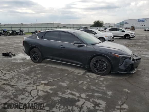 ✅ 2025 Kia K4 GT-Line Turbo • VIN: 3KPFW4DC8SE101320 • Lot: 71191955. Listed on Copart with 9,399 mi. Free auction sales archive from the USA and detailed vehicle history report at DreamBid. Image 4.