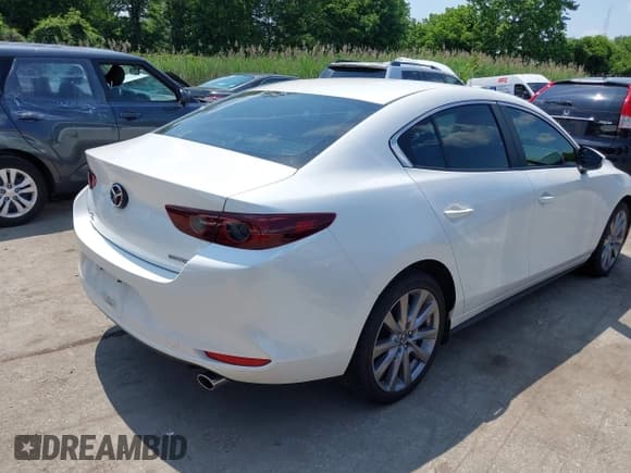 ✅ 2021 Mazda 3 Select • VIN: 3MZBPBBL6MM254531 • Lot: 42446016. Listed on IAAI with 36,168 mi. Free auction sales archive from the USA and detailed vehicle history report at DreamBid. Image 4.