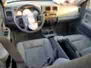 2007 Dodge Dakota ST z VIN 1D7HW28PX7S265270, wystawiony jako Copart lot #78265494 z przebiegiem 154 418 mil mil oraz Szkoda całkowita • Salvage title. Historia ofert i sprzedaży dostępna na DreamBid. Obrazek 8.