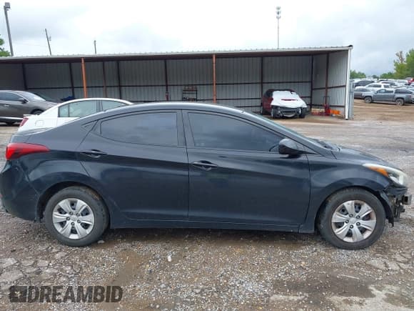 ✅ 2016 Hyundai Elantra SE • VIN: 5NPDH4AE6GH712831 • Lot: 40330106. Listed on IAAI with 186,539 mi. Free auction sales archive from the USA and detailed vehicle history report at DreamBid. Image 13.
