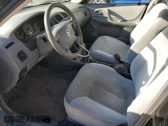 ✅ 2000 Mazda Protege DX • VIN: JM1BJ2220Y0239835 • Lot: 80228864. Wystawiony na Copart z przebiegiem 200 936 mil. Bezpłatny archiwum sprzedaży aukcyjnych z USA i szczegółowy raport historii pojazdu na DreamBid. Zdjęcie 7.