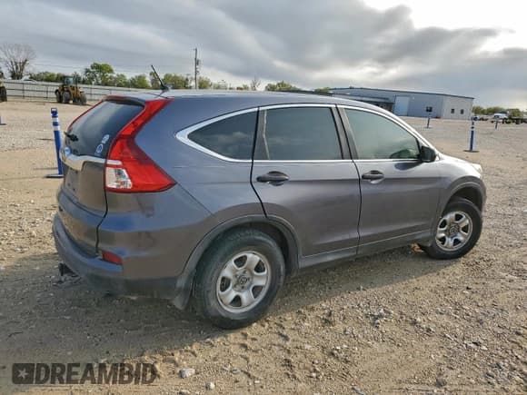 ✅ 2015 Honda CR-V LX • VIN: 2HKRM3H33FH504646 • Лот: 94085895. Опубликован ранее на Copart с пробегом 231 581 миль. Бесплатный доступ к архиву аукционных продаж из США и подробный отчёт об истории автомобиля на DreamBid. Изображение 3.