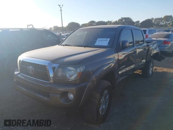 ✅ 2011 Toyota Tacoma PreRunner • VIN: 3TMJU4GN6BM121911 • Lot: 43452559. Listed on IAAI with 242,271 mi. Free auction sales archive from the USA and detailed vehicle history report at DreamBid. Image 2.