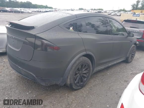 ✅ 2016 Tesla Model X 70D • VIN: 5YJXCDE28GF026378 • Lot: 42352156. Listed on IAAI with 103,206 mi. Free auction sales archive from the USA and detailed vehicle history report at DreamBid. Image 4.