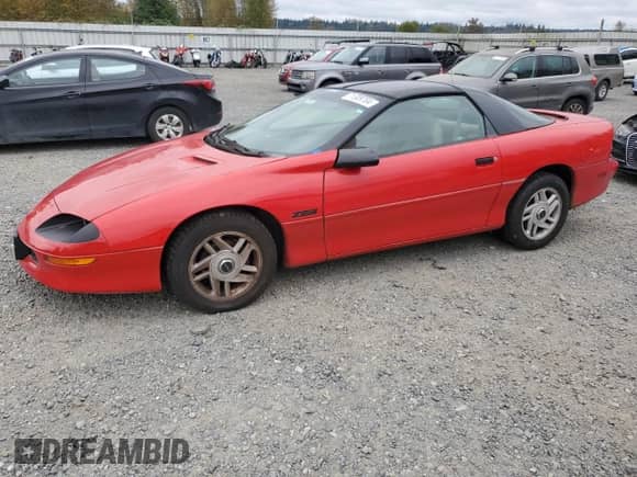 1994 Chevrolet Camaro Z28 z VIN 2G1FP22P6R2111426, wystawiony jako Copart lot #71309704 z przebiegiem 187 063 mil mil oraz Szkoda całkowita • Salvage title. Historia ofert i sprzedaży dostępna na DreamBid. Obrazek 1.