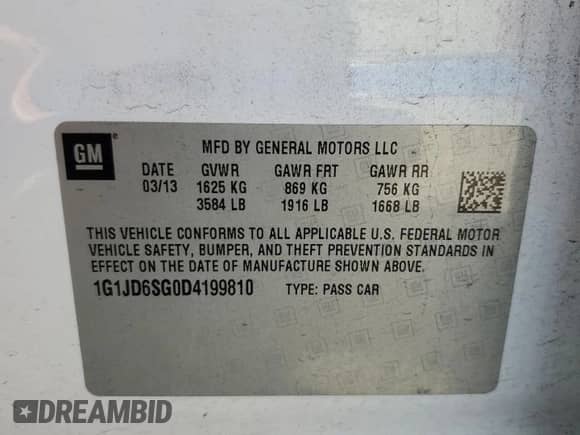 2013 Chevrolet Sonic LT z VIN 1G1JD6SG0D4199810, wystawiony jako Copart lot #63103015 z przebiegiem 128 825 mil mil oraz Szkoda całkowita • Salvage title. Historia ofert i sprzedaży dostępna na DreamBid. Obrazek 13.