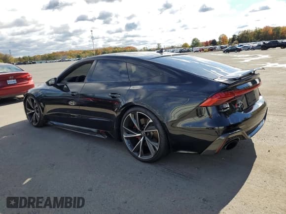 ✅ 2021 Audi RS 7 • VIN: WUAPCBF27MN905275 • Lot: 84887475. Wystawiony na Copart z przebiegiem Nie podano. Bezpłatny archiwum sprzedaży aukcyjnych z USA i szczegółowy raport historii pojazdu na DreamBid. Zdjęcie 2.