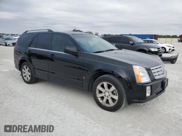 ✅ 2006 Cadillac SRX • VIN: 1GYEE63A760144999 • Лот: 87649445. Опубликован ранее на Copart с пробегом 85 765 миль. Бесплатный доступ к архиву аукционных продаж из США и подробный отчёт об истории автомобиля на DreamBid. Изображение 4.