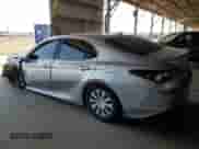 2021 Toyota Camry Hybrid LE with VIN 4T1C31AK5MU554381, listed as a Copart auction lot 69998775 with 104,313 mi miles and Salvage title. Bid and sale history available at DreamBid. Image 2.