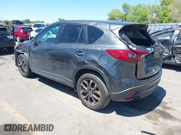 ✅ 2016 Mazda CX-5 Grand Touring • VIN: JM3KE4DY3G0912088 • Lot: 42203530. Wystawiony na IAAI z przebiegiem 86 914 mil. Bezpłatny archiwum sprzedaży aukcyjnych z USA i szczegółowy raport historii pojazdu na DreamBid. Zdjęcie 3.