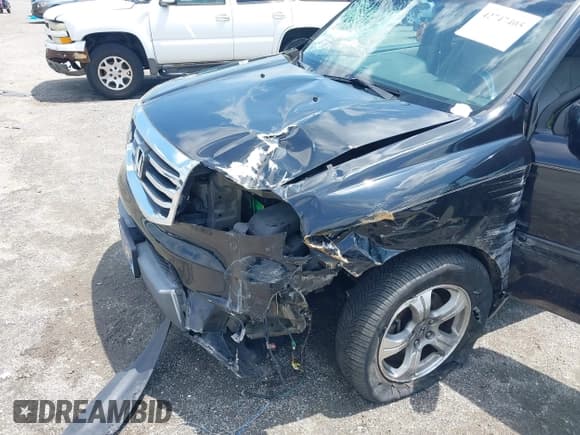 ✅ 2012 Honda Pilot EX-L • VIN: 5FNYF4H70CB065320 • Lot: 42747405. Wystawiony na IAAI z przebiegiem 105 976 mil. Bezpłatny archiwum sprzedaży aukcyjnych z USA i szczegółowy raport historii pojazdu na DreamBid. Zdjęcie 6.