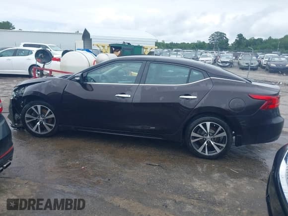 ✅ 2016 Nissan Maxima SL • VIN: 1N4AA6AP7GC409207 • Lot: 42550056. Wystawiony na IAAI z przebiegiem 121 749 mil. Bezpłatny archiwum sprzedaży aukcyjnych z USA i szczegółowy raport historii pojazdu na DreamBid. Zdjęcie 14.