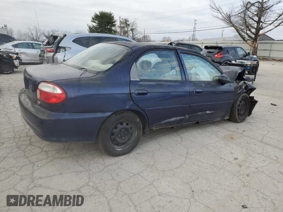 ✅ 2000 Kia Sephia • VIN: KNAFB1215Y5826418 • Lot: 82665084. Listed on Copart with Not provided. Free auction sales archive from the USA and detailed vehicle history report at DreamBid. Image 3.