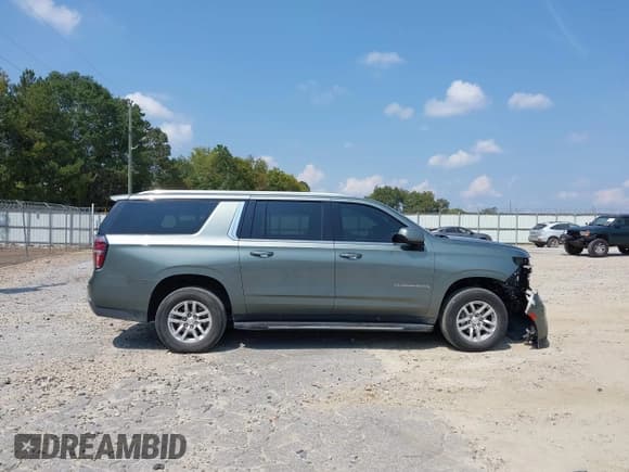 ✅ 2023 Chevrolet Suburban LT • VIN: 1GNSCCKD5PR278813 • Lot: 43251006. Wystawiony na IAAI z przebiegiem 89 249 mil. Bezpłatny archiwum sprzedaży aukcyjnych z USA i szczegółowy raport historii pojazdu na DreamBid. Zdjęcie 14.