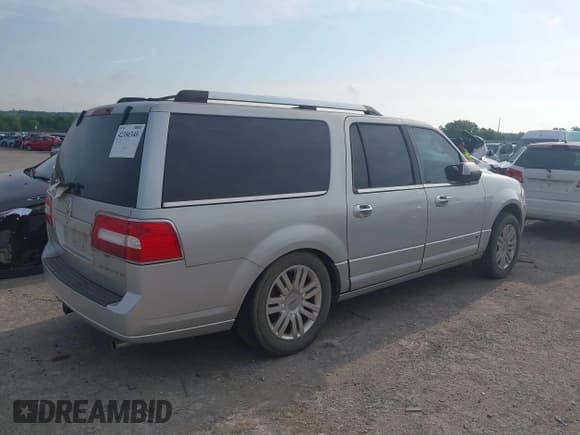 ✅ 2013 Lincoln Navigator • VIN: 5LMJJ3H59DEL09289 • Lot: 42380340. Listed on IAAI with 238,384 mi. Free auction sales archive from the USA and detailed vehicle history report at DreamBid. Image 4.